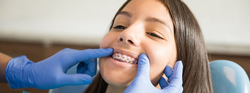 Navigating Orthodontic Emergencies and Finding Solutions Orthodontic Emergencies Utah emergency emergencies Genesis Dental and Orthodontics dentist near me, children's dentistry, pediatric dentistry, family dentisry, general dentistry, cosmetic dentistry, braces, metal braces, traditional braces, invisalign, clearcorrect, clear aligners, damon brackets, emergency dental dentistry, dental implant, implants, crown, crowns, cerec, filling, fillings, sealant, sealants, bond, bonding, frenectomy, gum recontouring, root planing, dentures, partial denture, full dentures, implant retained denture, cracked tooth, loose teeth, discolored tooth porcelain fillings, tooth-colored amalgam fillings, dental exam, xray, cleaning, cleanings, teeth whitening, zoom whitening, dentist open on saturday, dentist open on sunday, emergency dentist serving utah and kansas, serving SALT LAKE CITY, UT,TAYLORSVILLE, UT, SOUTH JORDAN, UT, OREM, UT, MAGNA, UT, WEST VALLEY CITY, UT, DISTRICT ORTHODONTICS UT, BRIGHT SMILES DENTAL UT, THANKSGIVING POINT, CENTRAL AVE DENTAL KS, OVERLAND PARK, KS