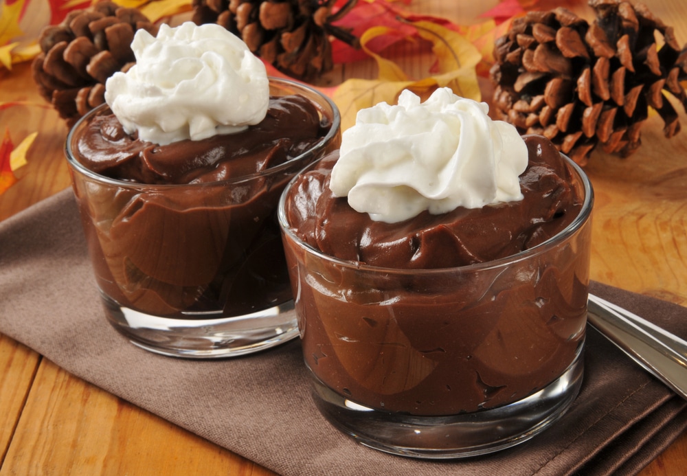 thanksgiving pudding with whipped cream on top