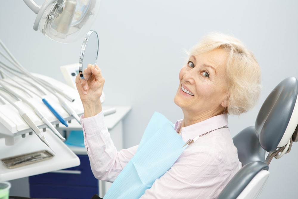 Dental Implants VS Dentures Genesis Dental Utah & Kansas Dentist